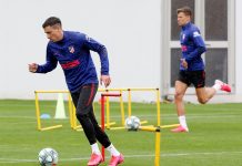 El Atlético entrena bajo la lluvia en Majadahonda